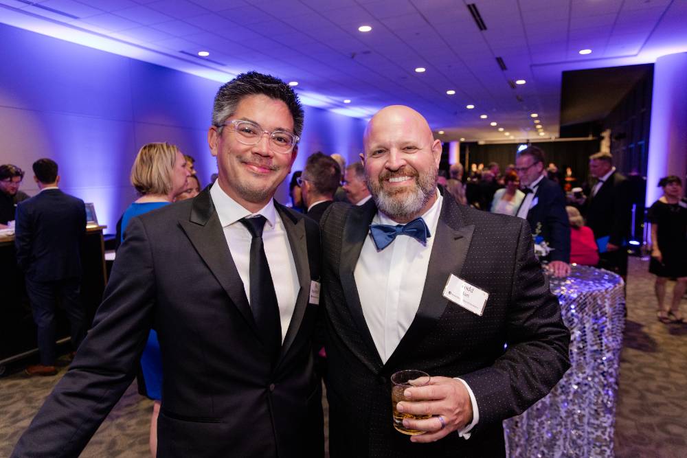 Two gentlemen enjoying Enrichment